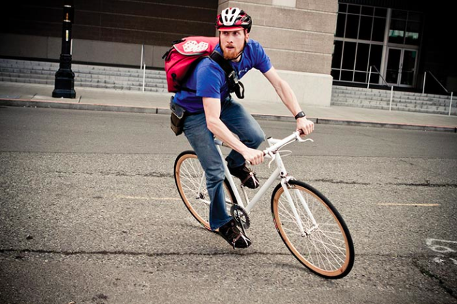 barney riding on a bike